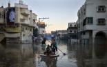 Floods and Boycotts Direct U.S. to Address Occupation 